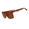 Angled view of translucent brown square sunglasses w/ a tortoiseshell pattern & brown nonreflective lenses tilted down.