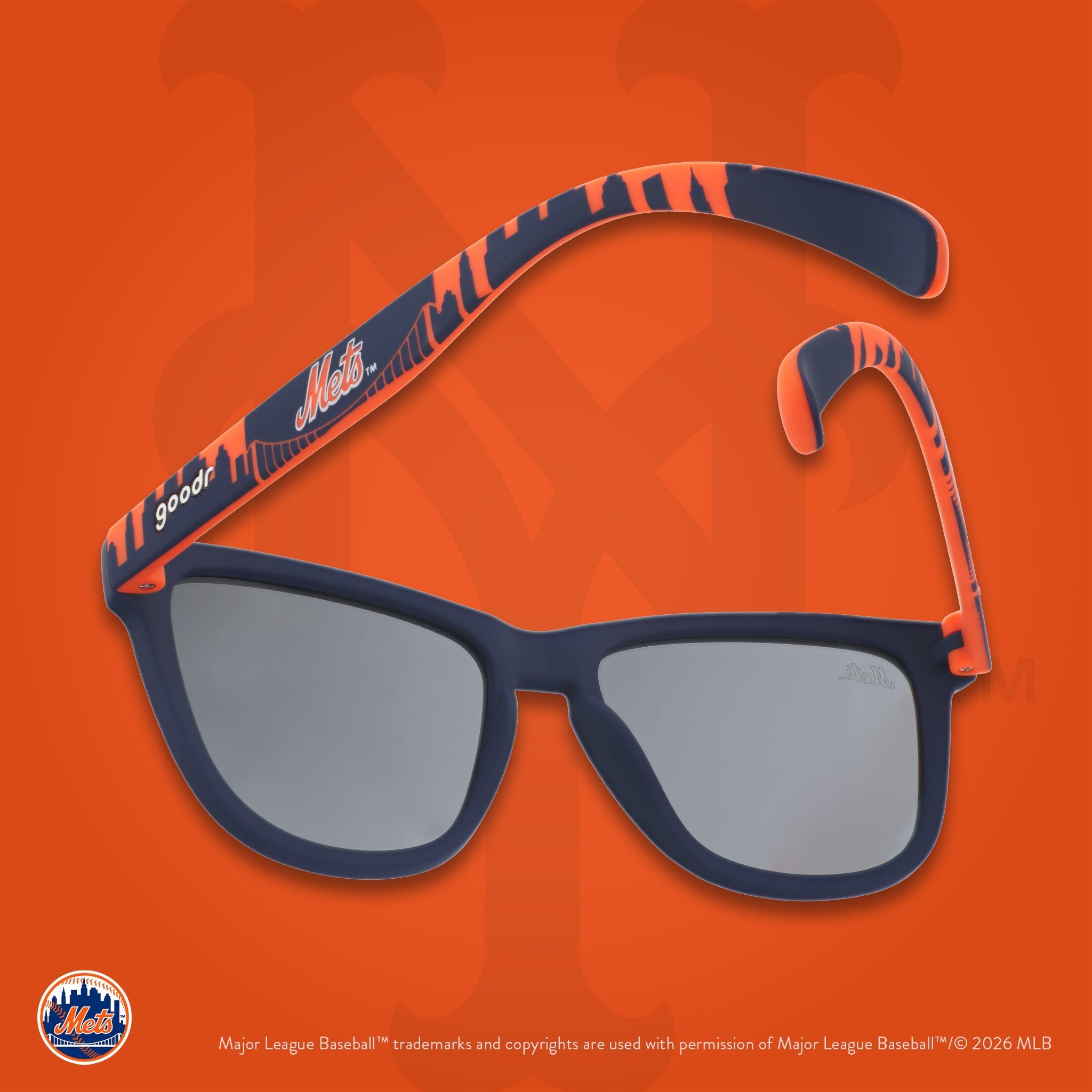 Blue and orange Mets shades floating against an orange background featuring the team's NY logo.