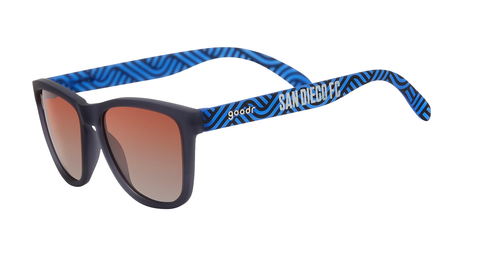 Angled view of shades tilted down. Dark gray frames w/ blue waves, San Diego FC on temples+orange gold gradient lenses.