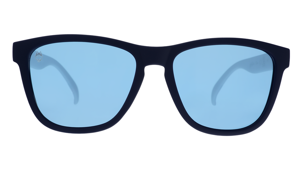 Front view of navy blue and white Huskies sunglasses with black lenses.