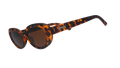 Three-quarter angle view of oval tortoiseshell sunglasses with brown polarized lenses against a white background.