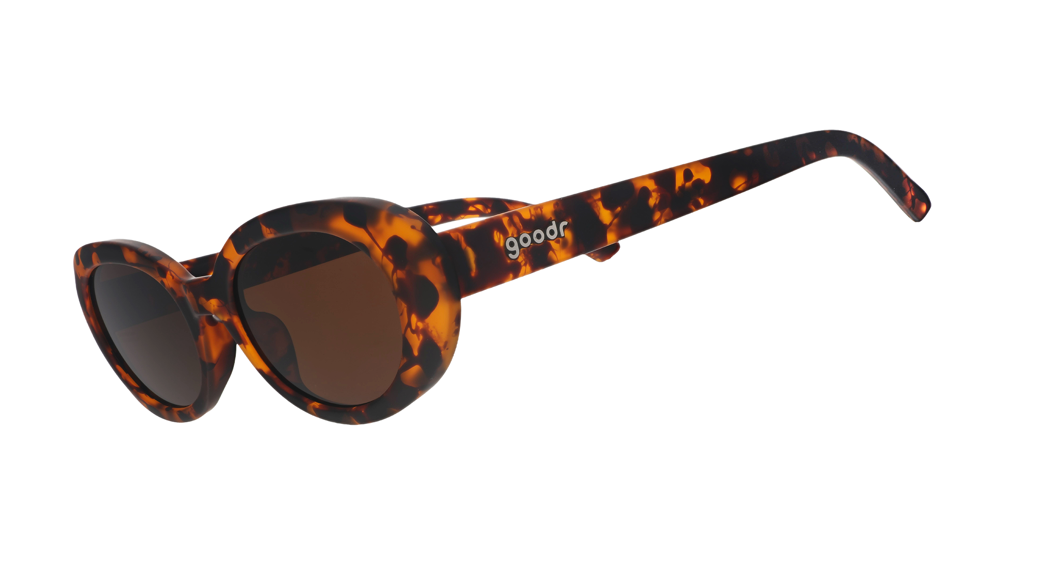 Three-quarter angle view of oval tortoiseshell sunglasses with brown polarized lenses against a white background.