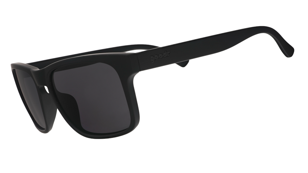 Three-quarter angle view of black Grand Gs with black non-reflective lenses.
