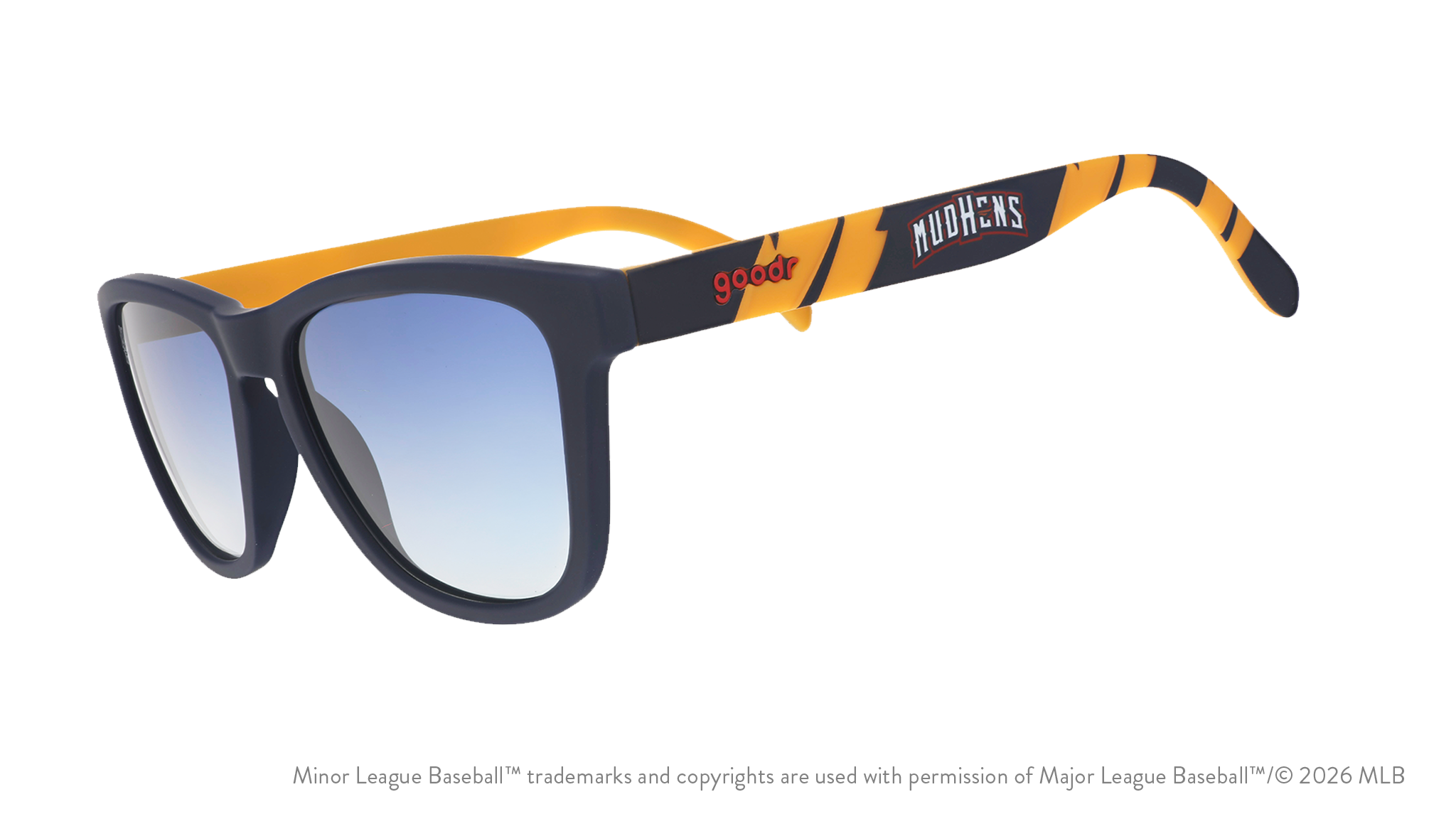 Three-quarter angle view of shades. Blue frames w/ a yellow pattern, Mud Hens on temples + blue gradient lenses.