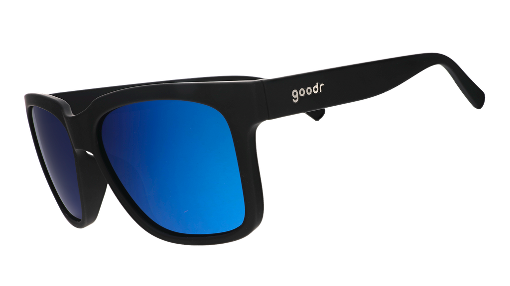 Three-quarter angle view of black sunglasses with blue lenses designed to float in water.