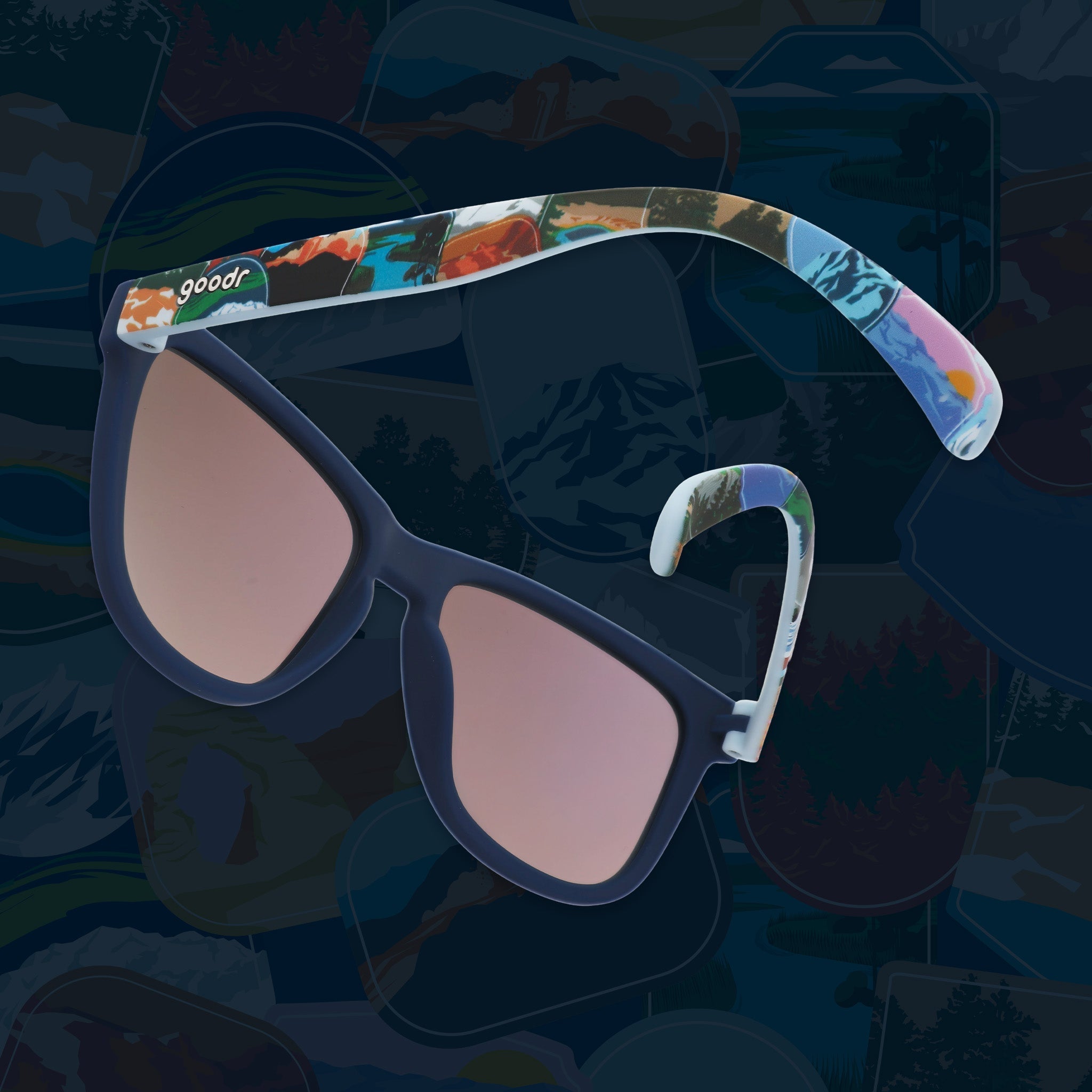 Side view of navy sunglasses with blue reflective lenses and colorful National Park Foundation temples.
