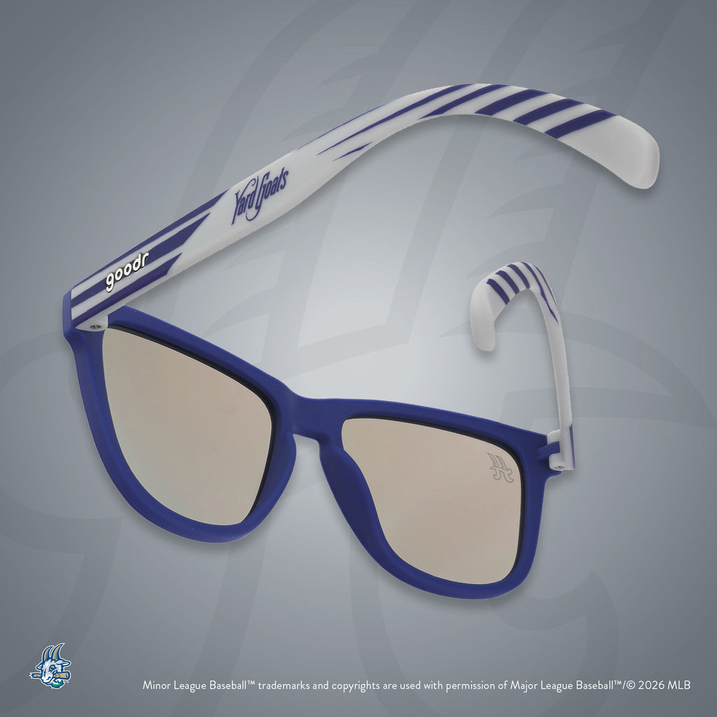 Back view of sunglasses tilted down. Blue + gray frames w/ Yard Goats on temples. Teal reflective lenses.
