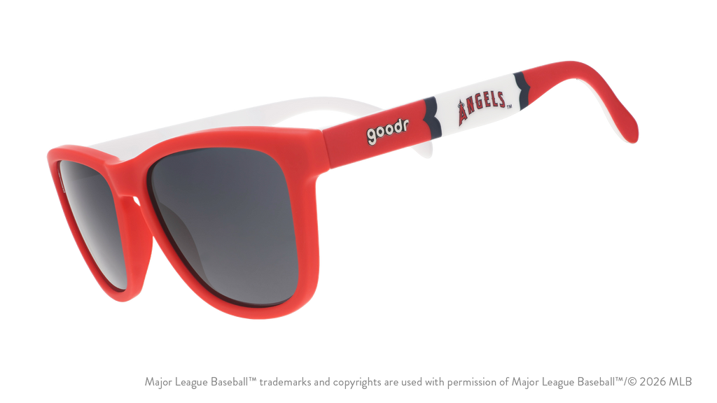 Three-quarter angle view of a pair of red, white, and blue sunglasses featuring the Angels' "halo A" logo on the arm.