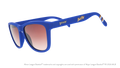 Three-quarter angle view of shades. Blue frames w/ stripe pattern+Bull City on temples. Brown gradient lenses.