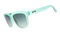 Light mint green sunglasses with a glossy finish, featuring gradient lenses and the "goodr" logo on the temple.