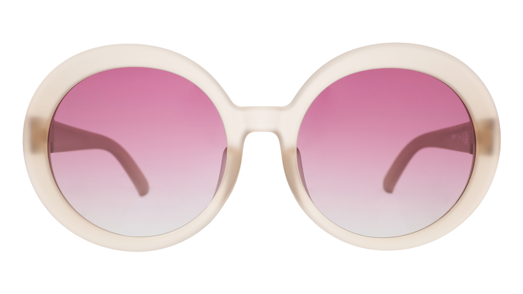 Front view of oversized round beige sunglasses with purple gradient lenses against a white background.