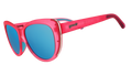 Cat-eye goodr sunglasses with pink frames and blue lenses on a white background.