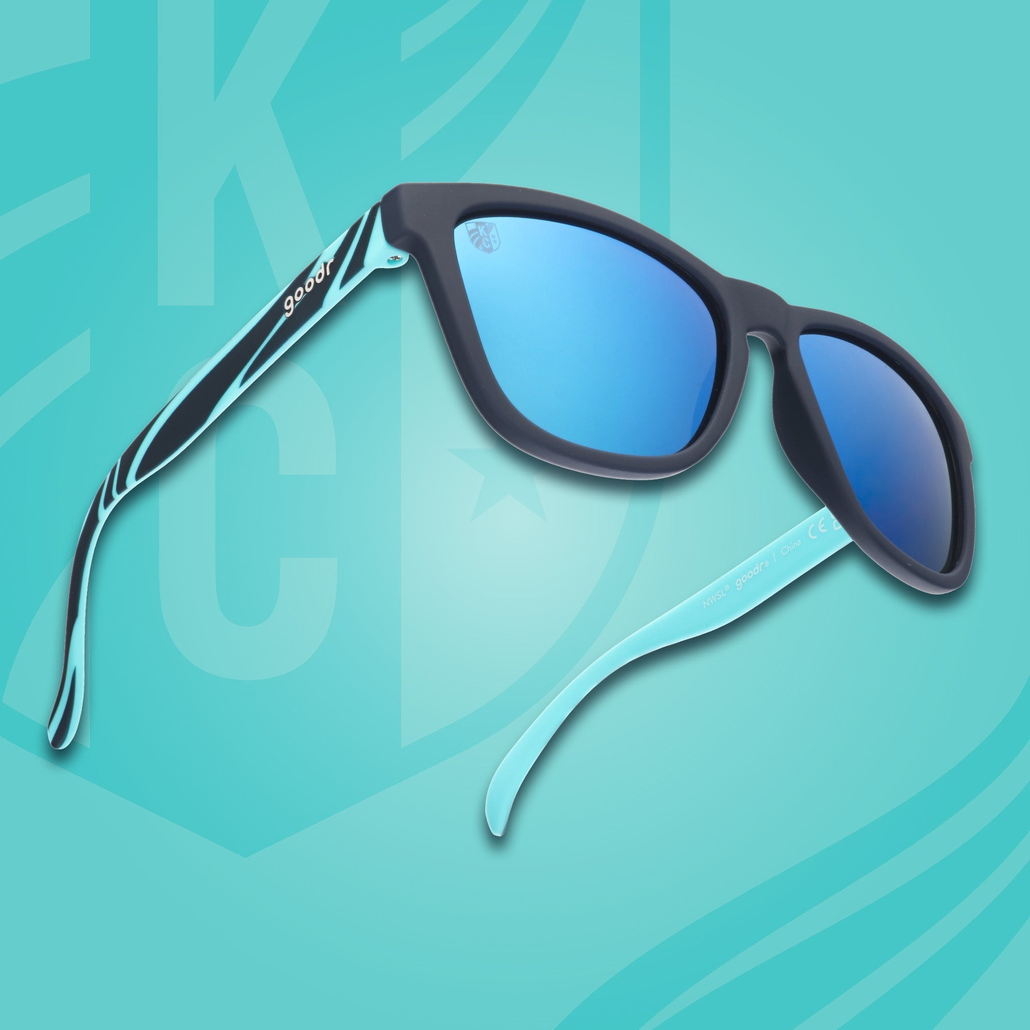 Right three-quarter angle view of teal and storm blue sunglasses with a river current pattern, teal lenses, and goodr logo.