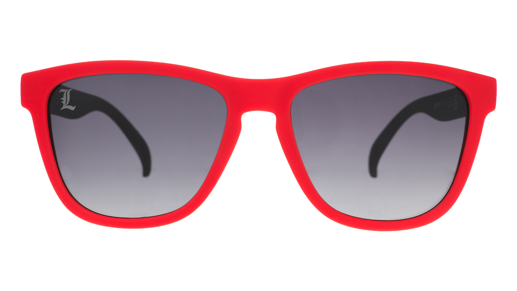 Front view of black and Cardinal red sunglasses featuring black gradient lenses with the Louisville “L” etched on the right lens.