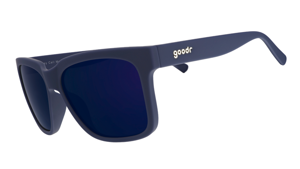 Three-quarter angle view of dark blue sunglasses with dark blue lenses designed to float in water.