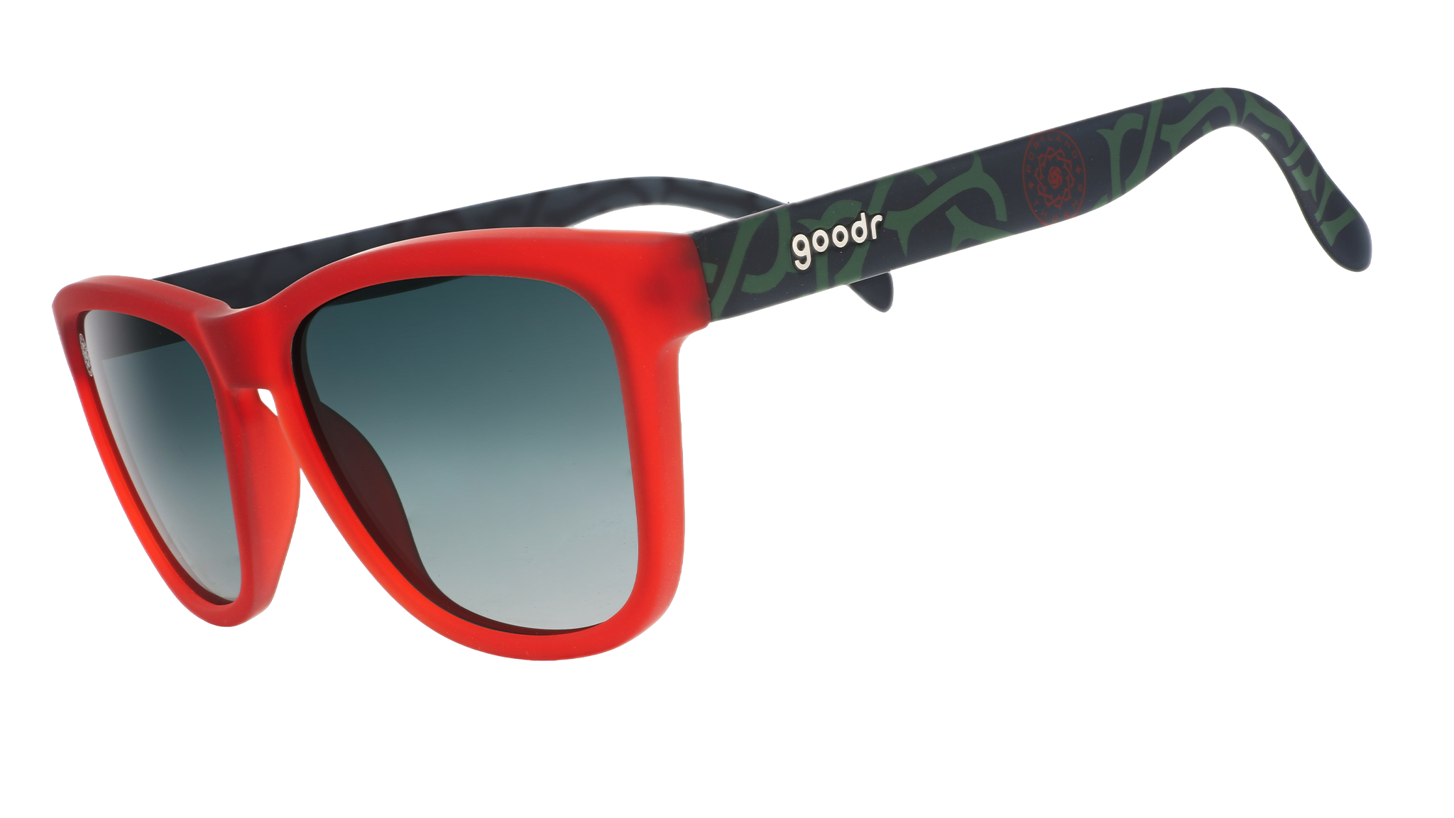 Three-quarter angle view of red and black frames with a green thorn pattern, green gradient lenses, and the Portland Thorns logo.