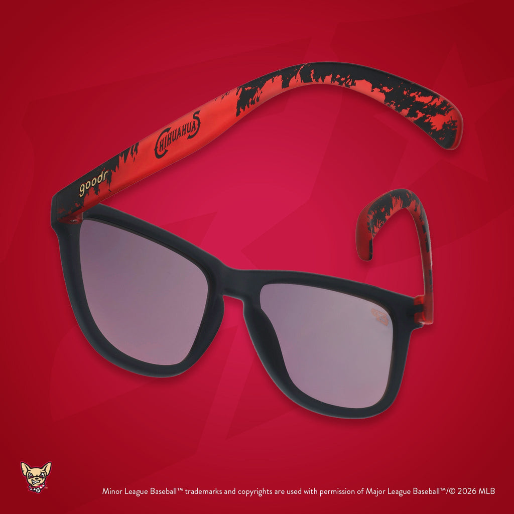 Back view of sunglasses tilted down. Dark gray+red frames w/ Chihuahuas on temples. Amber reflective lenses.