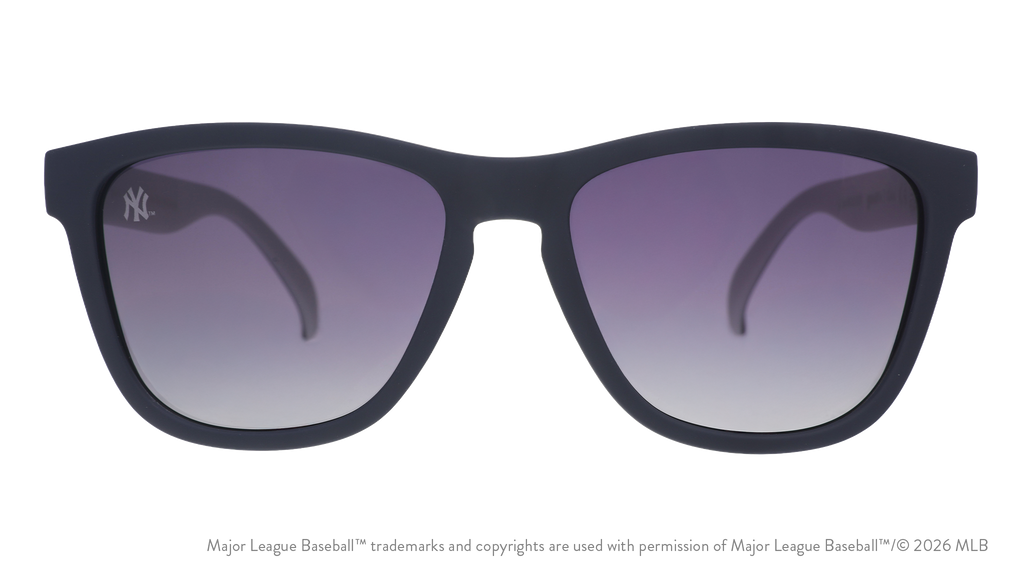 Front view of Mets shades with blue faceplate. Chrome reflective lenses have the team's script logo etched on the left lens.
