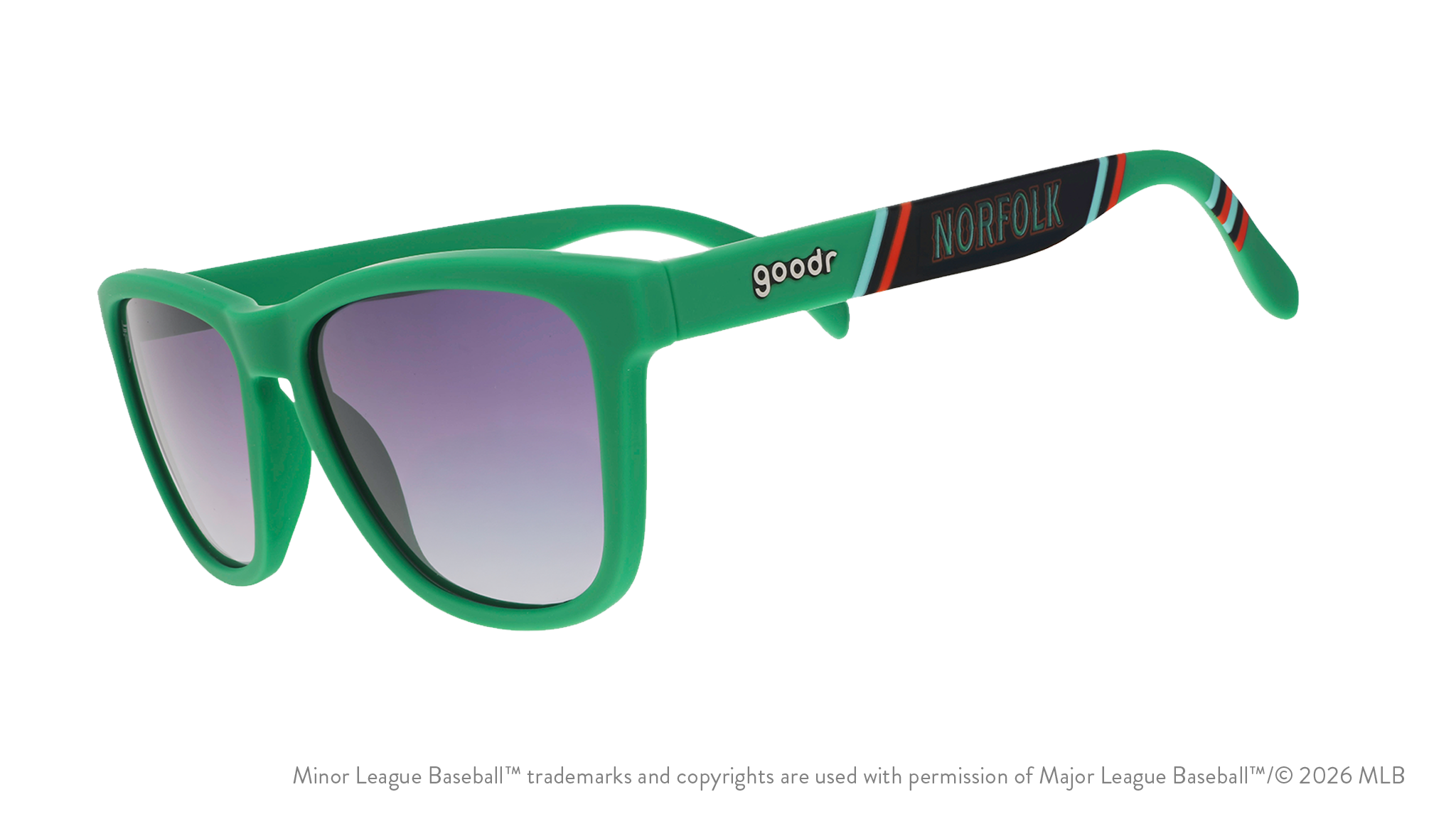 Three-quarter angle view of sunglasses. Green frames w/ a stripe pattern + Norfolk on temples. Black gradient lenses.