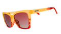 Three-quarter angle view of translucent yellow-orange sunglasses with red hand-painted whirls & rose ocean gradient lenses.