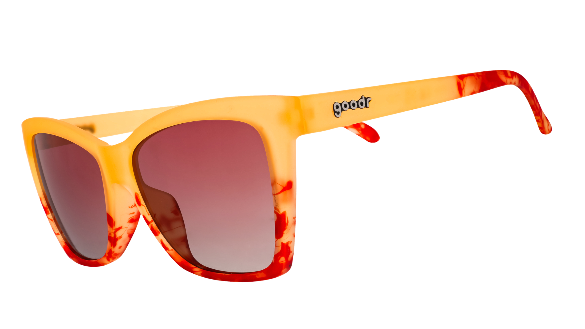 Three-quarter angle view of translucent yellow-orange sunglasses with red hand-painted whirls & rose ocean gradient lenses.