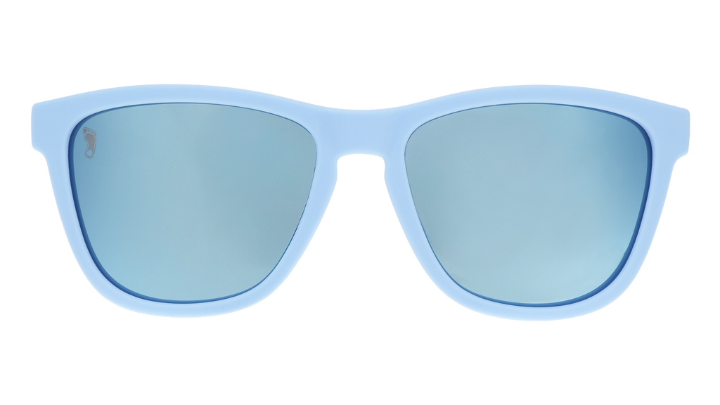 Front view of Carolina blue and white sunglasses featuring ice blue reflective lenses and the UNC Tar Heel etched on the right lens.