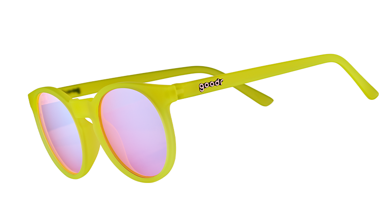 Three-quarter angle view of yellow round sunglasses with rose-tinted circle lenses.