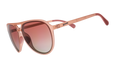 Three-quarter angle view of translucent pink aviator sunglasses with rose gradient lenses.
