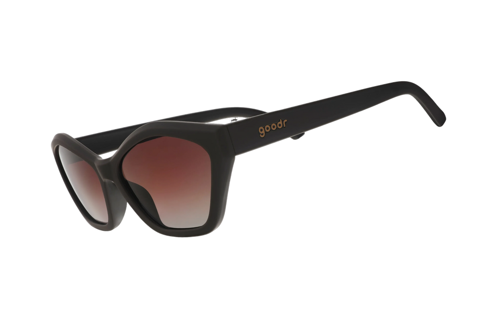 Black sunglasses with gradient lenses on a white background