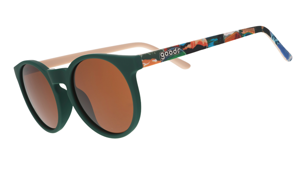 Green round sunglasses with brown non-reflective lenses and colorful National Park Foundation artwork on the temples.