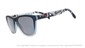 Three-quarter angle view of shades. Gray frames w/ mountain pattern, Rainiers on temples + black non-reflective lenses.