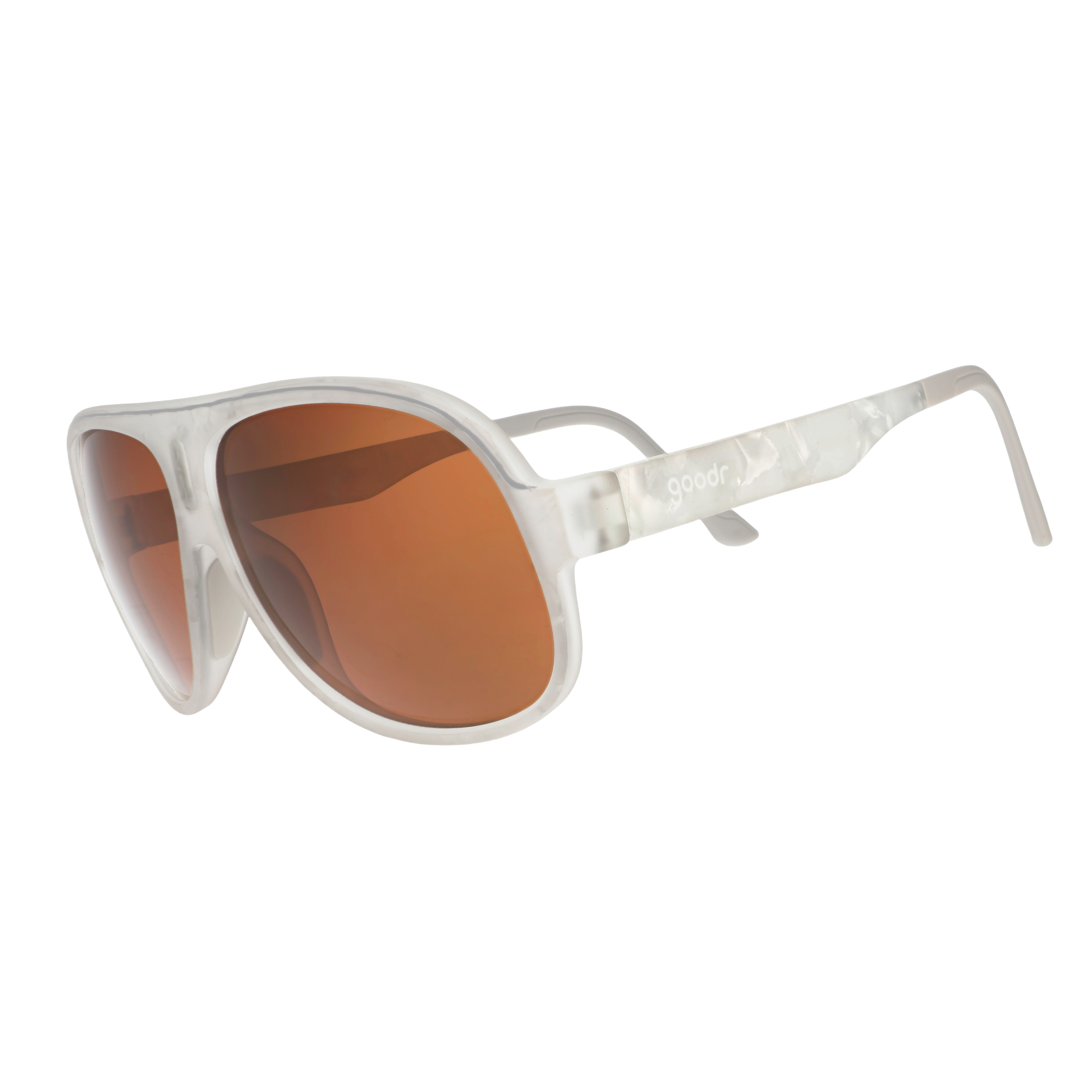 Aviator sunglasses with a translucent white frame and brown non-reflective lenses.