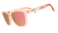 Three-quarter angle view of translucent pink sol rosa sunglasses with reflective champagne gold lenses & ACFC logo.