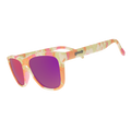 Three-quarter angle view of cheery yellow and pink tie-dye sunglasses in a classic frame shape with pink reflective lenses.