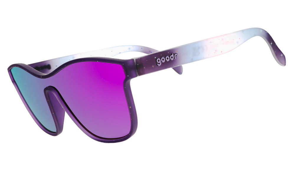 Three-quarter view of translucent purple-blue ombre VRG frames featuring a cosmos design and pink-purple reflective lens.