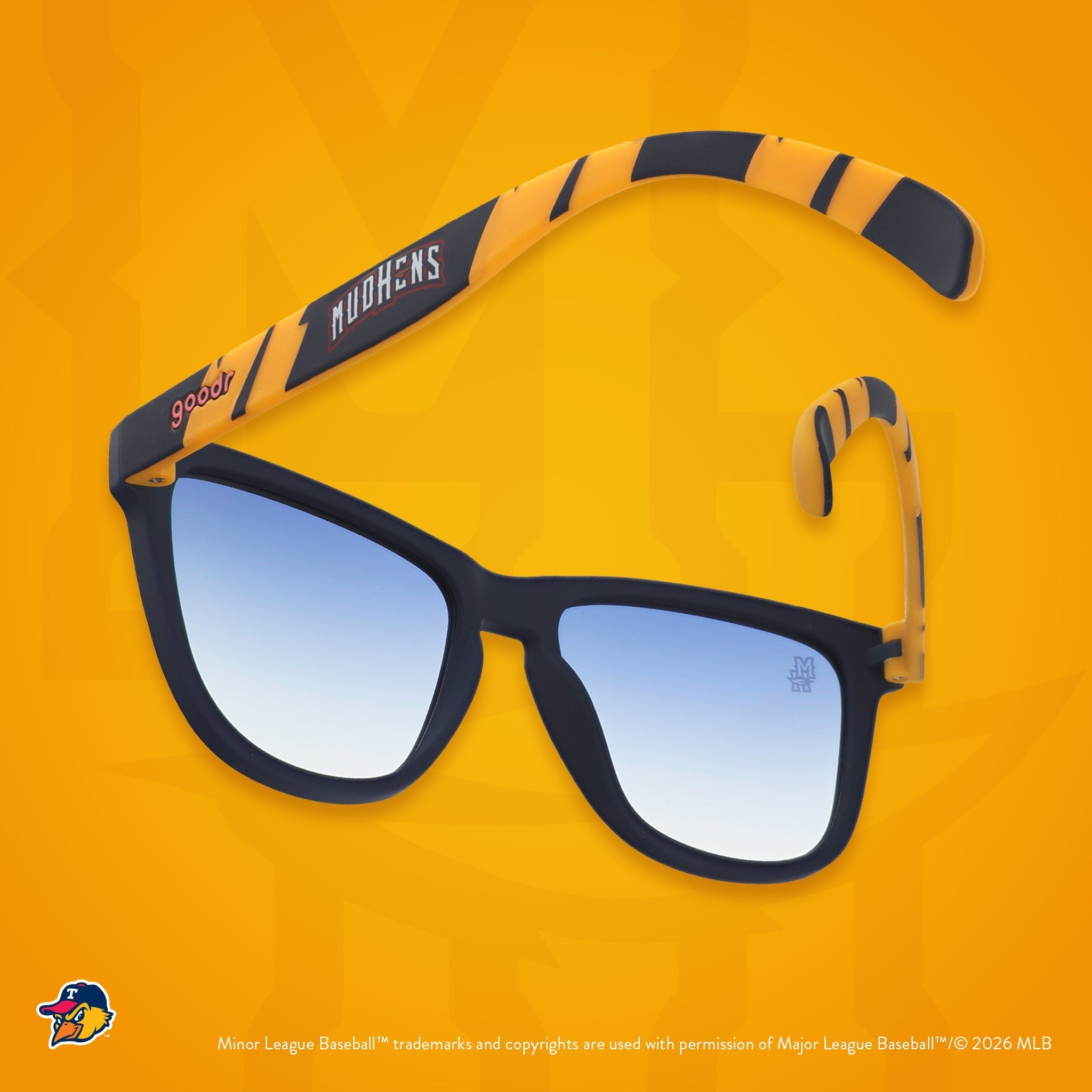 Back view of sunglasses. Blue frames w/ a yellow pattern, Mud Hens on temples + blue gradient lenses.