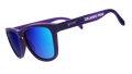 Sunglasses with blue lenses and purple frame on a white background
