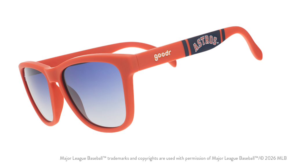 Three-quarter angle view of orange and navy Astros sunglasses featuring an Astros logo on the arm.