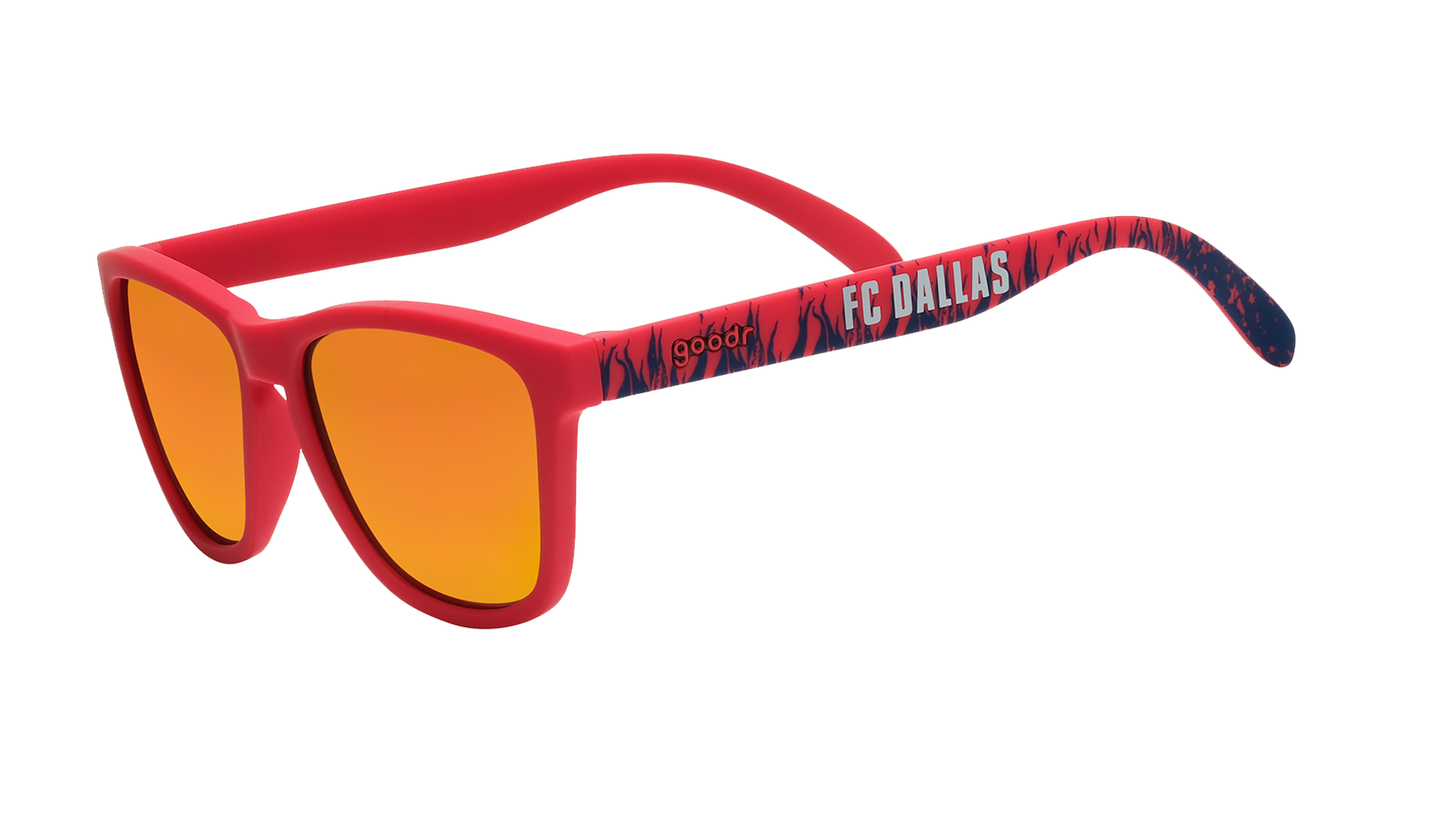 Three-quarter angle view of shades tilted down. Red frames w/blue flames+FC Dallas on temples. Amber reflective lenses.