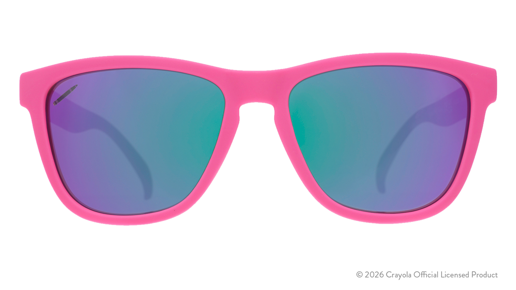 Front view of magenta sunglasses. Magenta front frame w/ purple pink reflective lenses+small crayon etching on lens.