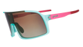 Three-quarter angle view of teal wrap sunglasses with pink arms and amber gradient lenses.