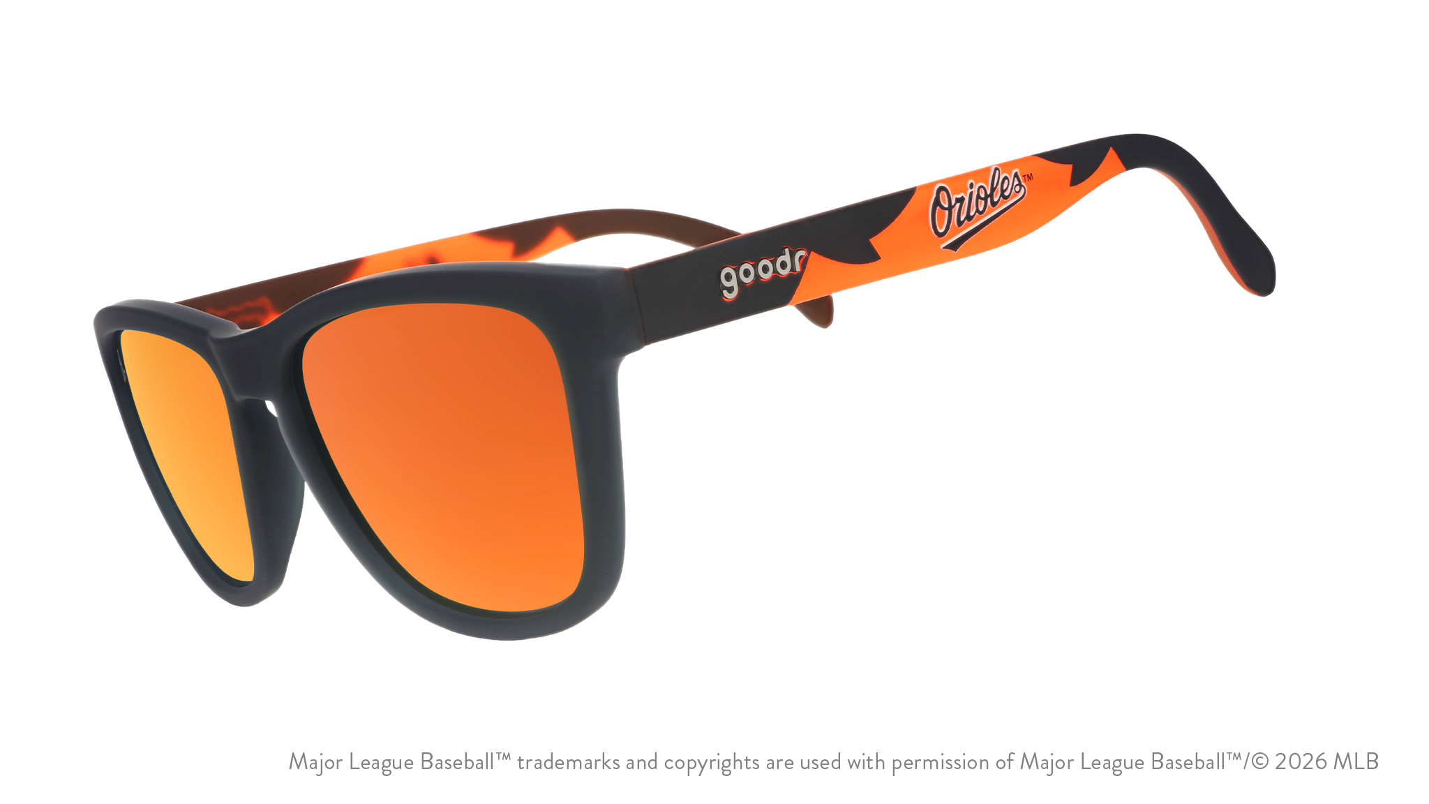 Three-quarter angle view of a pair of black and orange sunglasses featuring the Orioles script logo on the arm.