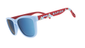 Three-quarter angle view of MLS Colorado Rapids shades tilted down. Blue+red patterned frames. Ice blue reflective lenses.