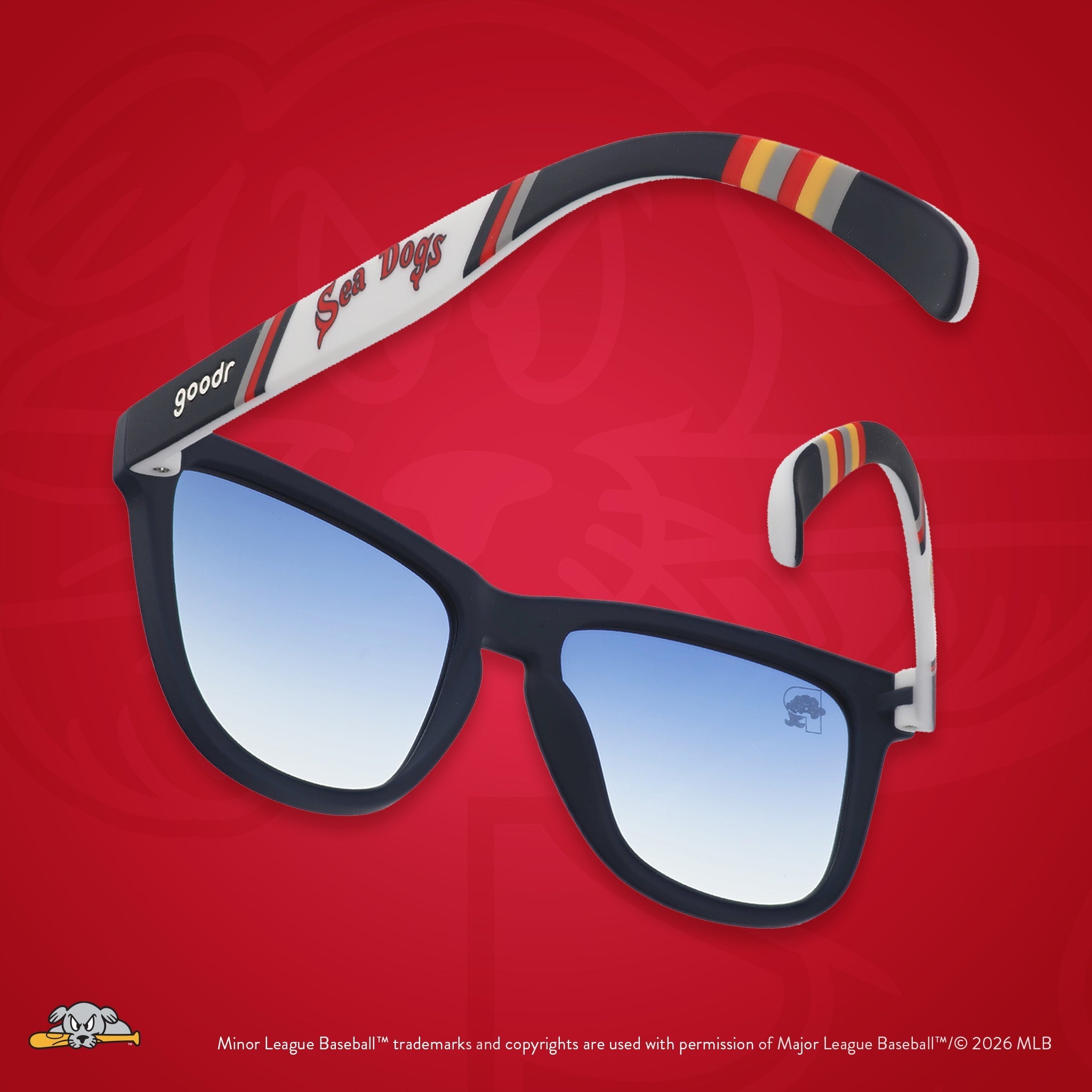 Back view of sunglasses. Dark blue frames w/ Sea Dogs on temples + blue gradient lenses.
