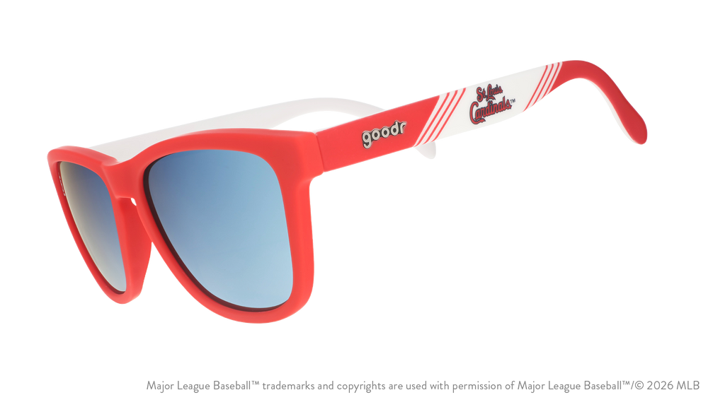 Three-quarter angle view of red and white Cardinals sunglasses featuring the St. Louis Cardinals logo on the arm.
