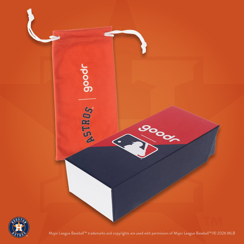 Photograph of custom packaging, featuring an orange Astros-branded microfiber bag and MLB-themed product box.
