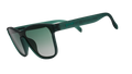 Three-quarter angle view of translucent teal one-lens sunglasses with green gradient lenses.