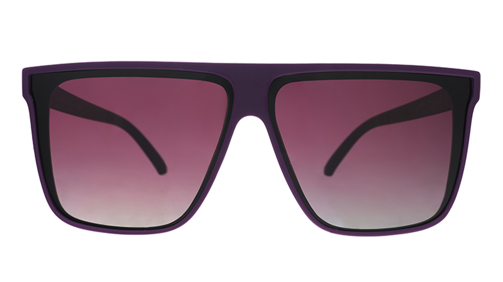 Front-facing view of a pair of oversized, dark purple flat-top sunglasses with deep purple gradient lenses.
