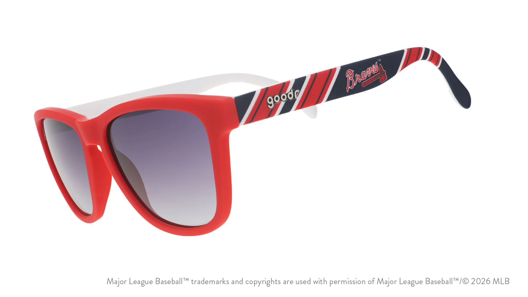 Three-quarter angle view of red, white, and navy Braves sunglasses featuring the script and tomahawk logo on the arm.