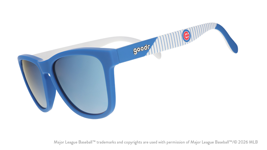 Three-quarter angle view of blue and white Cubs sunglasses featuring the classic Wishbone C logo on the arm.